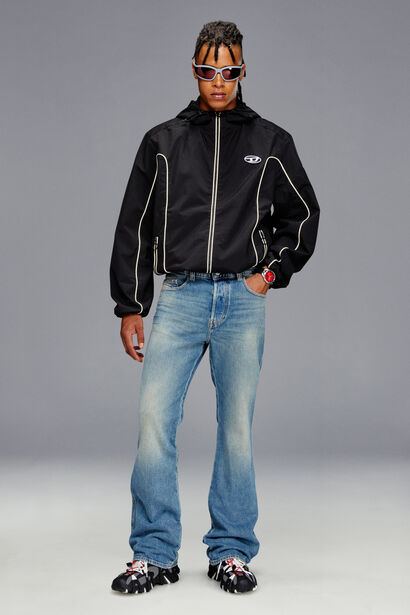 An elongated Bootcut fit with a mid-rise waist and low crotch. 